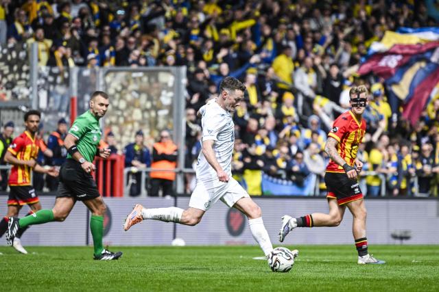 Mechelen's Belgian centre #16 Rob Schoofs kicks the ball  during the Belgian Pro League play-off football match between KV Mechelen and Royale Union Saint-Gilloise at the Achter de Kazerne stadium in Mechelen on April 12, 2026. (Photo by Tom Goyvaerts / Belga / AFP) / Belgium OUT