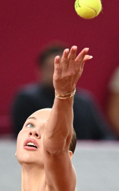 Austria's Anastasia Potapova serves the ball to Mirra Andreeva (not pictured) during their women's single final match of the WTA Upper Austria Women's Linz tennis tournament in Linz, Austria on April 12, 2026. (Photo by BARBARA GINDL / APA / AFP) / Austria OUT