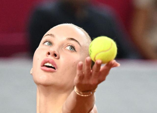 Austria's Anastasia Potapova serves the ball to Mirra Andreeva (not pictured) during their women's single final match of the WTA Upper Austria Women's Linz tennis tournament in Linz, Austria on April 12, 2026. (Photo by BARBARA GINDL / APA / AFP) / Austria OUT