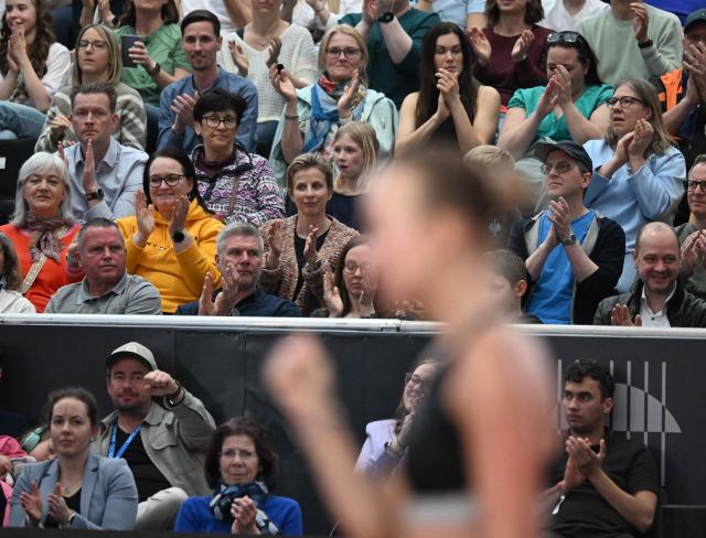 Austria's Anastasia Potapova reacts during her match plays against Mirra Andreeva (not pictured) as the spectators applaud during their women's single final match of the WTA Upper Austria Women's Linz tennis tournament in Linz, Austria on April 12, 2026. (Photo by BARBARA GINDL / APA / AFP) / Austria OUT