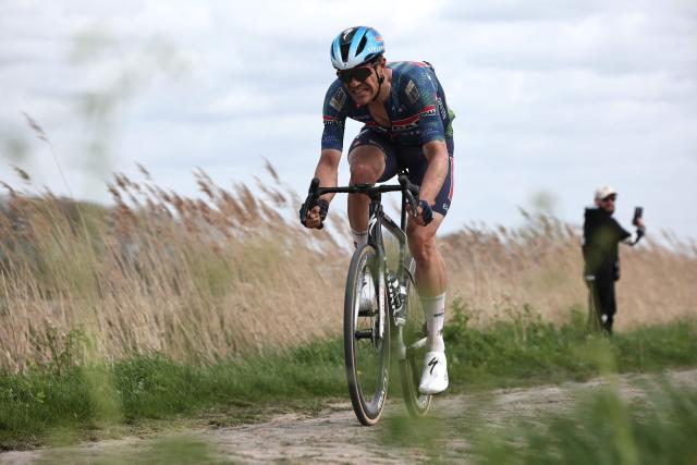 Soudal Quick-Step's Belgian rider Jasper Stuyven cycles on a cobblestone sector during the 123rd edition of the Paris-Roubaix one-day classic cycling race, 258.3 km between Compiègne and Roubaix, northern France, on April 12, 2026. (Photo by Anne-Christine POUJOULAT / AFP)