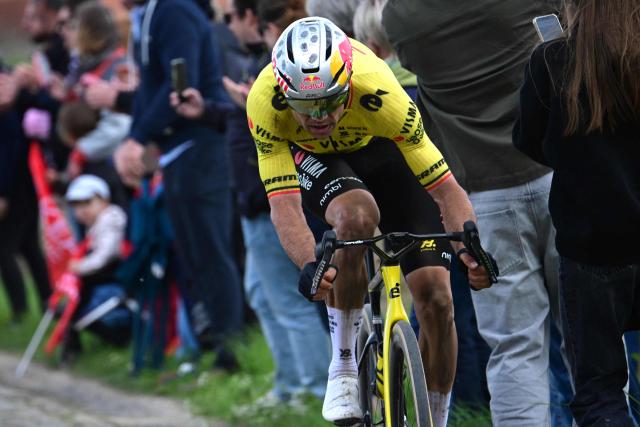 Team Visma - Lease a Bike's Belgian rider Wout van Aert cycles ahead during the 123rd edition of the Paris-Roubaix one-day classic cycling race, 258.3 km between Compiègne and Roubaix, northern France, on April 12, 2026. (Photo by Bernard PAPON / POOL / AFP)