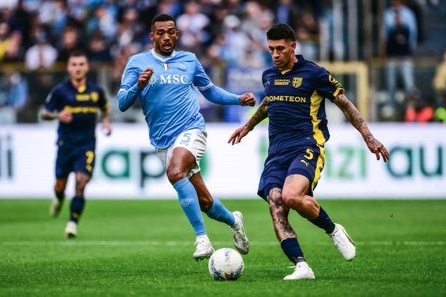 Napoli’s Brazilian defender #05 Juan Jesus (L) fights for the ball with Parma’s Argentine defender #05 Lautaro Valenti during the Italian Serie A football match between Parma Calcio 1913 and SSC Napoli at the Ennio Tardini Stadium in Parma on April 12, 2026. (Photo by MARCO BERTORELLO / AFP)