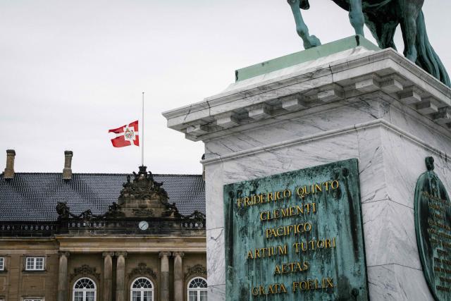The flags on the Amalienborg palace wave at half-mast on April 12, 2026, in Copernhagen, Denmark, after the announcement of Queen Mary's father's death. John Donaldson passed away on April 11, 2026 in the city of Hobart on Mary Dondaldson's birth island, Tasmania. (Photo by Emil Nicolai Helms / Ritzau Scanpix / AFP) / Denmark OUT