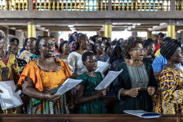 Members of a choir rehearse ahead of Pope Leo XIV’s visit at Saint Joseph Metropolitan Cathedral in Bamenda, on April 12, 2026. (Photo by PATRICK MEINHARDT / AFP)