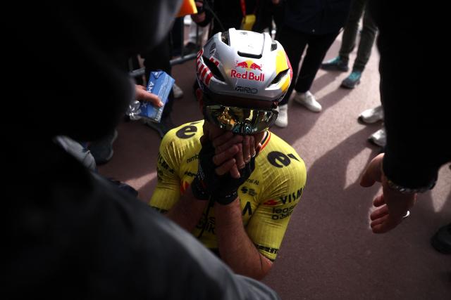 Team Visma - Lease a Bike's Belgian rider Wout van Aert celebrates victory at the end of the 123rd edition of the Paris-Roubaix one-day classic cycling race, 258.3 km between Compiègne and Roubaix, at the Vélodrome André-Pétrieux in Roubaix, northern France, on April 12, 2026. (Photo by Anne-Christine POUJOULAT / POOL / AFP)