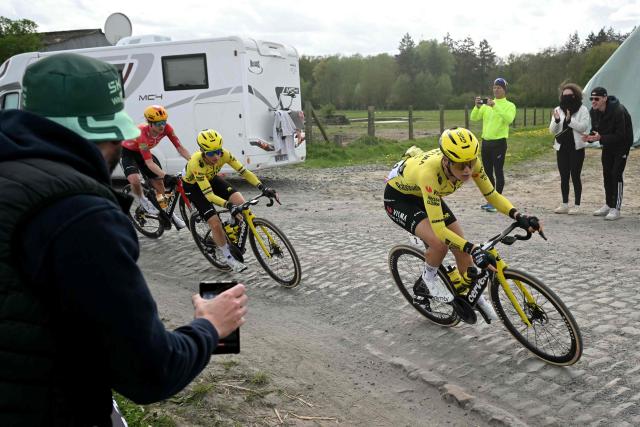 Team Visma - Lease a Bike's Dutch rider Daniek Hengeveld (R) leads the pack during the 6th edition of the Women Paris-Roubaix one-day classic cycling race, 143.1 km between Denain and Roubaix, northern France, on April 12, 2026. (Photo by NICOLAS TUCAT / AFP)