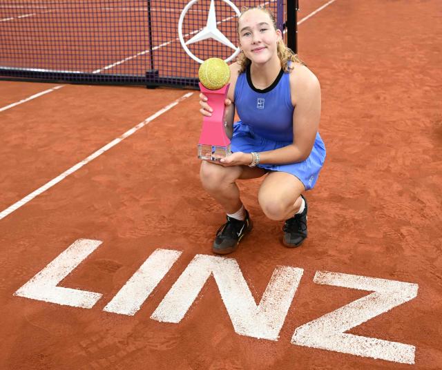Russia's Mirra Andreeva poses with her golden trophy after winning the women's single final match of the WTA Upper Austria Women's Linz tennis tournament in Linz, Austria on April 12, 2026. (Photo by BARBARA GINDL / APA / AFP) / Austria OUT