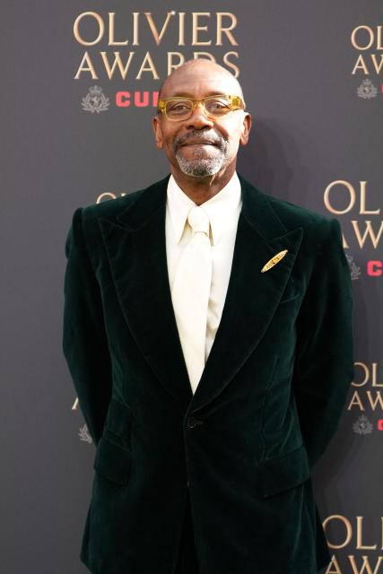 British comedian Lenny Henry poses on the green carpet upon arrival to attend The Olivier Awards at the Royal Albert Hall in central London on April 12, 2026. (Photo by CARLOS JASSO / AFP)