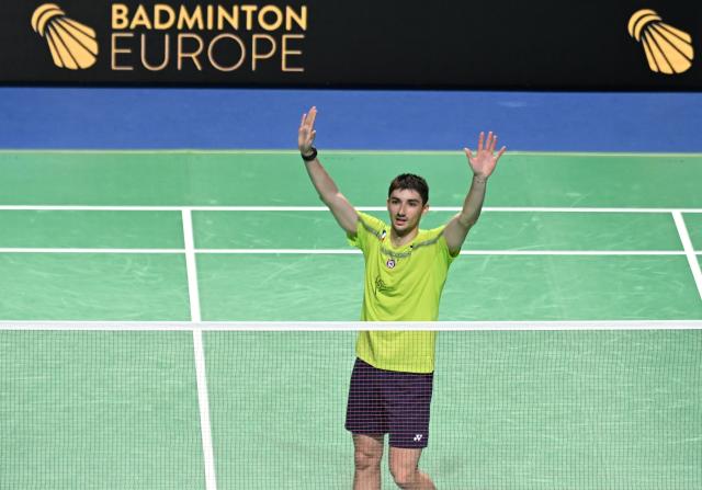 France’s Christo Popov celebrates winning Denmark’s Anders Antonsen in their men’s singles final match of the Badminton European Championships' final at the Carolina Marin Sports Palace in Huelva on April 12, 2026. (Photo by Cristina Quicler / AFP)