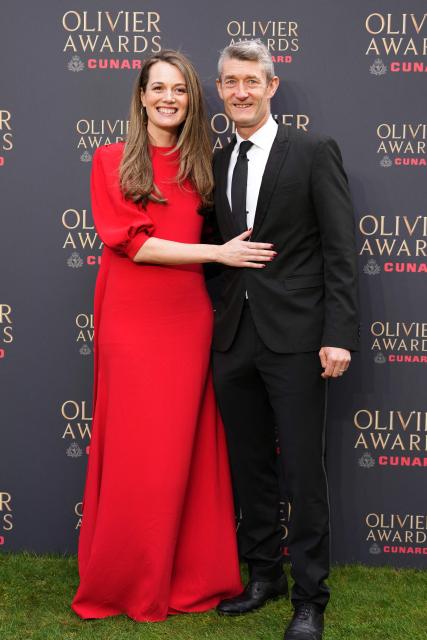 British theatre director Carrie Cracknell (L) poses on the green carpet upon arrival to attend The Olivier Awards at the Royal Albert Hall in central London on April 12, 2026. (Photo by CARLOS JASSO / AFP)