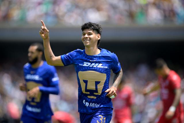 Pumas' Paraguayan forward #31 Robert Morales celebrates after scoring his team's first goal during the Liga MX Clausura tournament football match between Pumas and Mazatlan at the Olimpico Universitario stadium in Mexico City on April 12, 2026. (Photo by Alfredo ESTRELLA / AFP)
