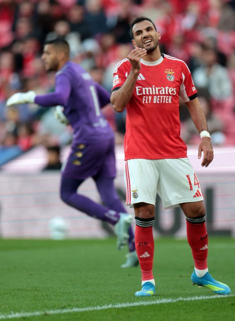 SL Benfica's Greek forward #14 Vangelis Pavlidis reacts to missing a penalty during the Portuguese League football match between SL Benfica and CD Nacional da Madeira at Luz Stadium in Lisbon on April 12 , 2026. (Photo by PATRICIA DE MELO MOREIRA / AFP)