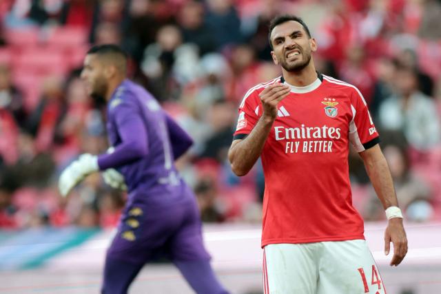 SL Benfica's Greek forward #14 Vangelis Pavlidis reacts to missing a penalty during the Portuguese League football match between SL Benfica and CD Nacional da Madeira at Luz Stadium in Lisbon on April 12 , 2026. (Photo by PATRICIA DE MELO MOREIRA / AFP)