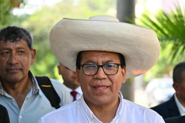 Peru's presidential candidate Roberto Sanchez of the Juntos por el Peru party arrives at a polling station in Lima on April 12, 2026, during the general election. Hours-long delays marred Peru's presidential and legislative elections on Sunday, as voters sought to end political chaos that has seen a string of presidents ousted or jailed. (Photo by Luis ROBAYO / AFP)