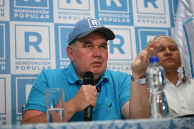 Peru’s presidential candidate for the Renovacion Popular party, Rafael Lopez Aliaga, speaks during a press conference after the polls closed in Lima on April 12, 2026. Police and prosecutors raided Peru’s electoral authority on April 12, as the country faced a deepening political crisis, after more than 63,000 voters were unable to cast their ballots in the presidential election due to the failure to deliver ballots, ballot boxes and other essential materials. (Photo by Luis ROBAYO / AFP)