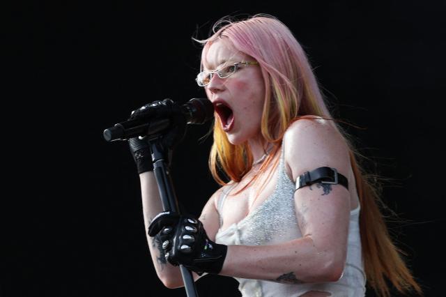 English musician Rhian Teasdale from English indie rock band Wet Leg performs on the Coachella stage during the 2026 Coachella Valley Music and Arts Festival in Indio, California on April 12, 2026. (Photo by VALERIE MACON / AFP)