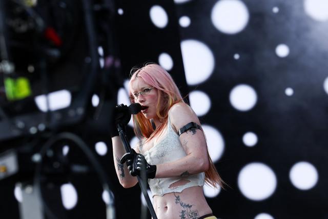 English musician Rhian Teasdale from English indie rock band Wet Leg performs on the Coachella stage during the 2026 Coachella Valley Music and Arts Festival in Indio, California on April 12, 2026. (Photo by VALERIE MACON / AFP)