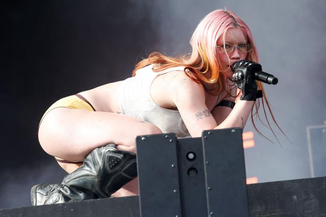 English musician Rhian Teasdale from English indie rock band Wet Leg performs on the Coachella stage during the 2026 Coachella Valley Music and Arts Festival in Indio, California on April 12, 2026. (Photo by VALERIE MACON / AFP)