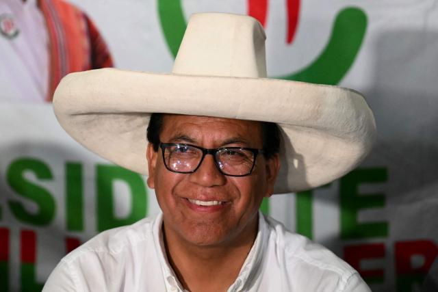 Peru's presidential candidate Roberto Sanchez of the Juntos por el Peru party, gives a speech following the first results of the presidential election in Lima on April 12, 2026. Right-wing candidate Keiko Fujimori led exit polls following Peru's troubled presidential election on April 12, 2026, but failed to avoid a runoff after a tight vote marred by irregularities and a police raid on the country's election authority. (Photo by Luis ROBAYO / AFP)