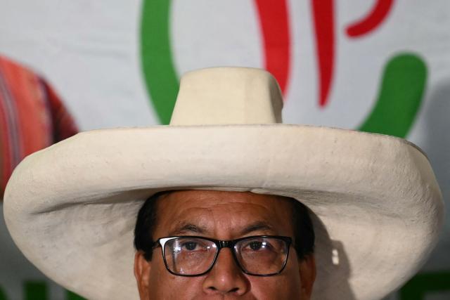 Peru's presidential candidate Roberto Sanchez of the Juntos por el Peru party, gives a speech following the first results of the presidential election in Lima on April 12, 2026. Right-wing candidate Keiko Fujimori led exit polls following Peru's troubled presidential election on April 12, 2026, but failed to avoid a runoff after a tight vote marred by irregularities and a police raid on the country's election authority. (Photo by Luis ROBAYO / AFP)