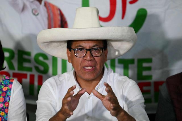Peru's presidential candidate Roberto Sanchez of the Juntos por el Peru party, gives a speech following the first results of the presidential election in Lima on April 12, 2026. Right-wing candidate Keiko Fujimori led exit polls following Peru's troubled presidential election on April 12, 2026, but failed to avoid a runoff after a tight vote marred by irregularities and a police raid on the country's election authority. (Photo by Luis ROBAYO / AFP)