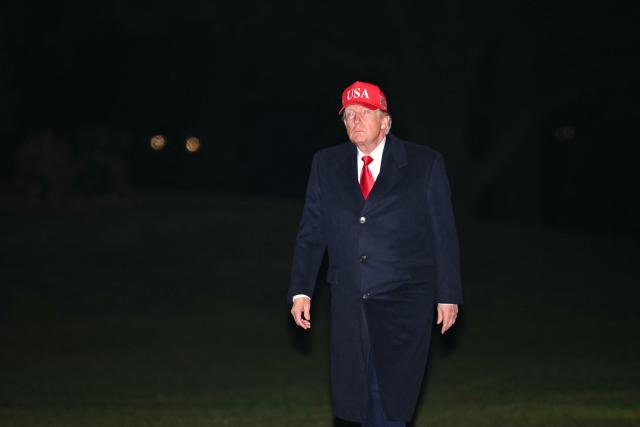 US President Donald Trump US President Donald Trump makes his way across the South Lawn of the White House upon returning to Washington, DC, on April 12, 2026. Trump is returning to Washington, DC, after he attended a UFC event and spending the weekend at his Trump National Doral Miami resort. (Photo by Mandel NGAN / AFP)