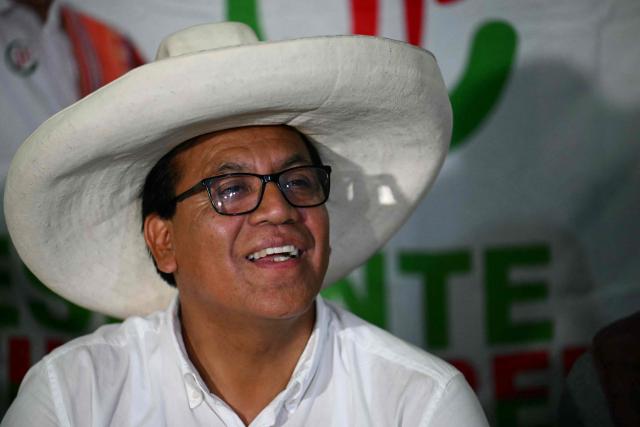 Peru's presidential candidate Roberto Sanchez of the Juntos por el Peru party, gives a speech following the first results of the presidential election in Lima on April 12, 2026. Right-wing candidate Keiko Fujimori led exit polls following Peru's troubled presidential election on April 12, 2026, but failed to avoid a runoff after a tight vote marred by irregularities and a police raid on the country's election authority. (Photo by Luis ROBAYO / AFP)