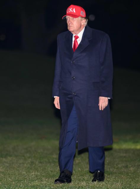 US President Donald Trump US President Donald Trump makes his way across the South Lawn of the White House upon returning to Washington, DC, on April 12, 2026. Trump is returning to Washington, DC, after he attended a UFC event and spending the weekend at his Trump National Doral Miami resort. (Photo by Mandel NGAN / AFP)