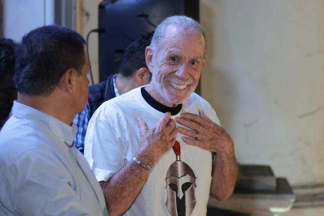 Peru’s presidential candidate Ricardo Belmont, running for the Civico Obras party, gestures at his party headquarters in Lima on April 12, 2026. Police and prosecutors raided Peru’s electoral authority on April 12, as the country faced a deepening political crisis, after more than 63,000 voters were unable to cast their ballots in the presidential election due to the failure to deliver ballots, ballot boxes and other essential materials. (Photo by Connie FRANCE / AFP)