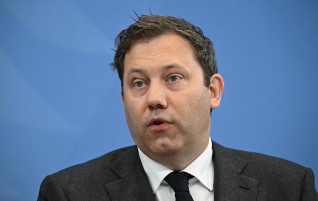 German Finance Minister and Vice Chancellor Lars Klingbeil from the social democratic SPD party speaks during a press briefing on the results of overnight coalition committee consultations, on April 13, 2026 at the Chancellery in Berlin. Chancellor Friedrich Merz said that Germany would cut petrol and diesel taxes for two months to provide relief to households and businesses hit by the energy shock during the Middle East war. (Photo by RALF HIRSCHBERGER / AFP)