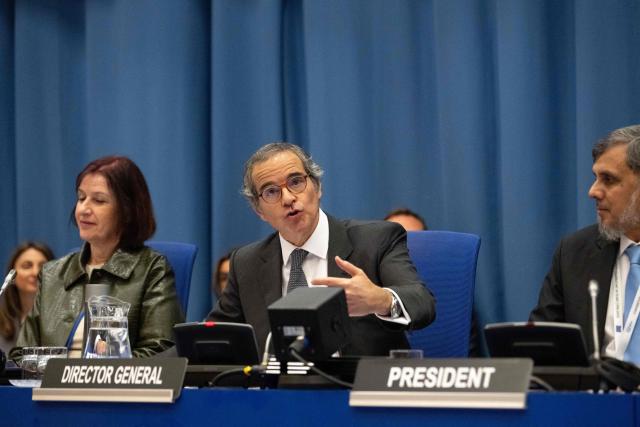 The Director General of the International Atomic Energy Agency (IAEA) Rafael Grossi (C) addresses the opening plenary session of IAEA’s Tenth Review Meeting at the agency's headquarters in Vienna, Austria, on April 13, 2026. (Photo by Joe Klamar / AFP)