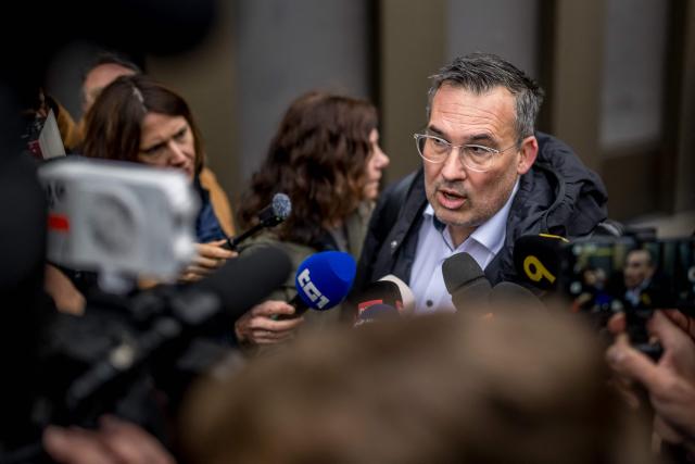One of the plaintiff's lawyer Sebastien Fanti arrives to the hearing of the Mayor of Crans-Montana Nicolas Feraud as part of the investigation over the fire that broke out in the bar "Le Constellation" during New Year celebrations, claiming 41 lives, most of whom were teenagers, and injuring 115 more, in Sion, western Switzerland, on April 13, 2026. (Photo by Fabrice COFFRINI / AFP)