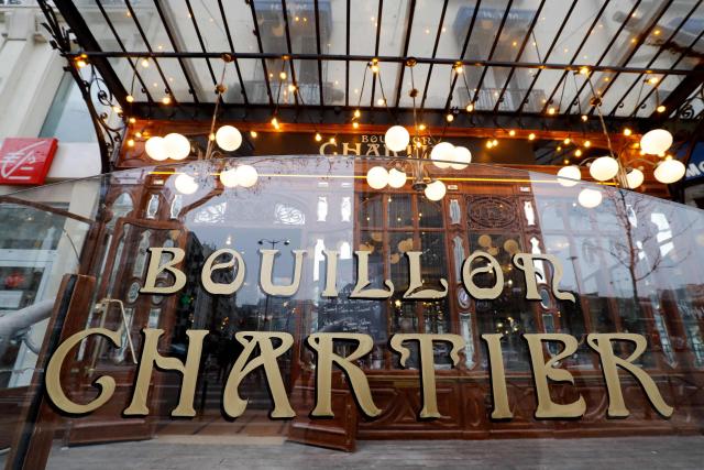 (FILES) General view of the entrance of the restaurant Bouillon Chartier Montparnasse after a recent restoration on February 6, 2019 in Paris. Bouillons, historically quick and inexpensive restaurants that offer traditional French dishes, have made a resurgence in France with 253 bouillon restaurants created over four year, according to Bernard Boutboul, a catering consultant. (Photo by FRANCOIS GUILLOT / AFP)