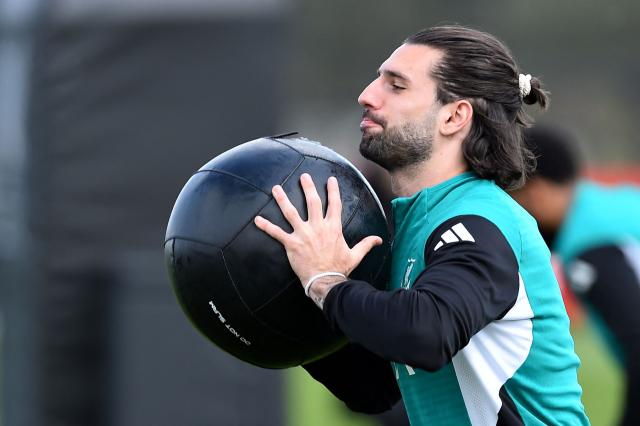 Liverpool's Hungarian midfielder #08 Dominik Szoboszlai attends a team training session at their training ground in Kirkby, Liverpool, north-west England on April 13, 2026, on the eve of their UEFA Champions League, quarter final second leg football match against Paris Saint-Germain. (Photo by PETER POWELL / AFP)