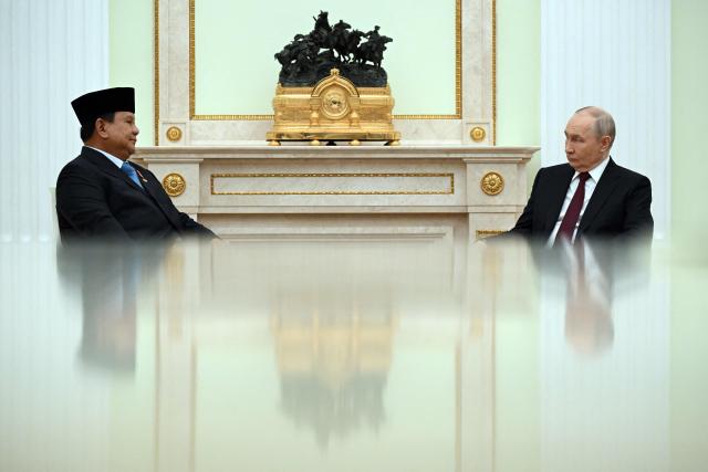 Russian President Vladimir Putin meets with his Indonesian counterpart Prabowo Subianto at the Kremlin in Moscow on April 13, 2026. (Photo by Igor IVANKO / POOL / AFP)