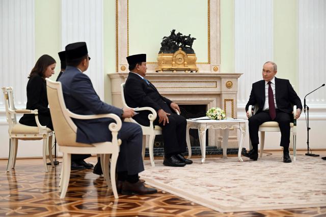 Russian President Vladimir Putin meets with his Indonesian counterpart Prabowo Subianto at the Kremlin in Moscow on April 13, 2026. (Photo by Igor IVANKO / POOL / AFP)