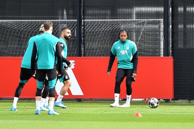 Liverpool's English striker #73 Rio Ngumoha (R) attends a team training session at their training ground in Kirkby, Liverpool, north-west England on April 13, 2026, on the eve of their UEFA Champions League, quarter final second leg football match against Paris Saint-Germain. (Photo by PETER POWELL / AFP)