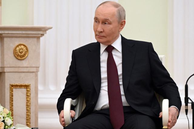 Russian President Vladimir Putin attends a meeting with his Indonesian counterpart at the Kremlin in Moscow on April 13, 2026. (Photo by Igor IVANKO / POOL / AFP)