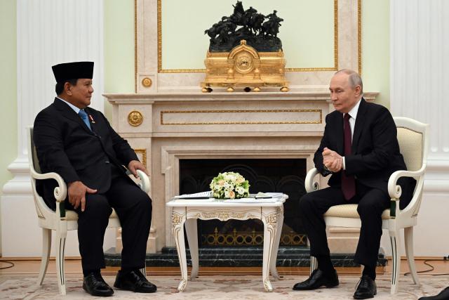 Russian President Vladimir Putin meets with his Indonesian counterpart Prabowo Subianto at the Kremlin in Moscow on April 13, 2026. (Photo by Igor IVANKO / POOL / AFP)