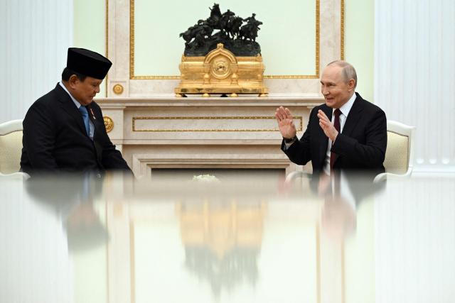 Russian President Vladimir Putin meets with his Indonesian counterpart Prabowo Subianto at the Kremlin in Moscow on April 13, 2026. (Photo by Igor IVANKO / POOL / AFP)