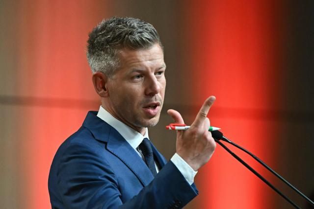 Peter Magyar, election winner and leader of the pro-European conservative TISZA party, delivers a press conference at the HUNGEXPO Congress and Exhibition Center in Budapest, Hungary, on April 13, 2026, one day after Hungarian general elections. The party of conservative Peter Magyar won a two-thirds parliamentary majority in Hungarian elections in a clear defeat for nationalist long-time Prime Minister Viktor Orban, according to near-complete results. (Photo by Attila KISBENEDEK / AFP)