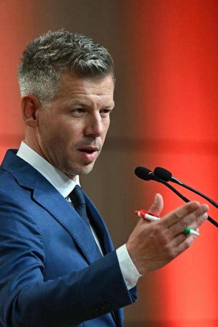 Peter Magyar, election winner and leader of the pro-European conservative TISZA party, delivers a press conference at the HUNGEXPO Congress and Exhibition Center in Budapest, Hungary, on April 13, 2026, one day after Hungarian general elections. The party of conservative Peter Magyar won a two-thirds parliamentary majority in Hungarian elections in a clear defeat for nationalist long-time Prime Minister Viktor Orban, according to near-complete results. (Photo by Attila KISBENEDEK / AFP)