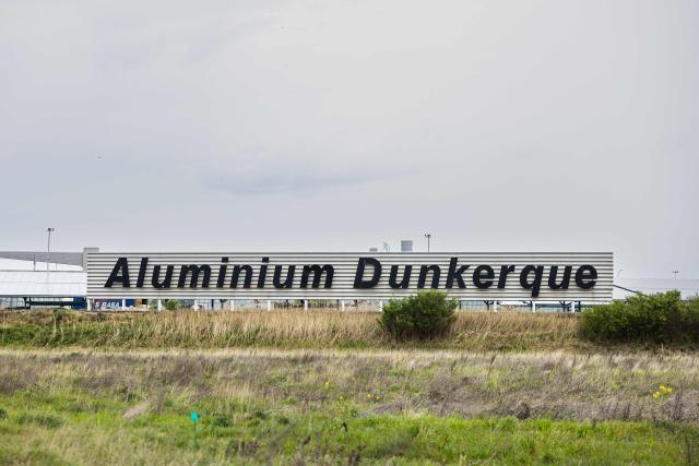 This photograph shows the logo of "Aluminium Dunkerque", the largest aluminium refinery in Europe and the largest industrial consumer of electricity, in Loon-Plage, northern France, on April 13, 2026. (Photo by Sameer Al-DOUMY / AFP)