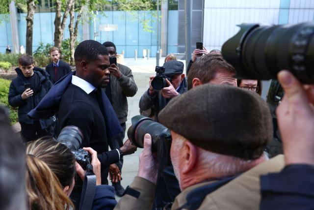Former Arsenal midfielder Thomas Partey departs following his hearing at the Southwark Crown Court in London on April 13, 2026. Partey, who now plays for Spanish club Villarreal, was charged in February with two further counts of rape. (Photo by Toby Shepheard / AFP)