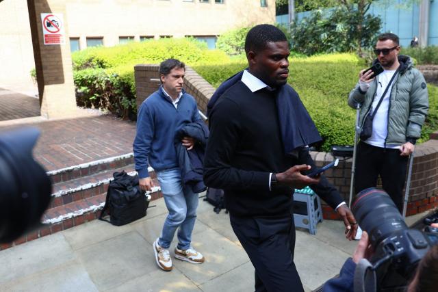 Former Arsenal midfielder Thomas Partey departs following his hearing at the Southwark Crown Court in London on April 13, 2026. Partey, who now plays for Spanish club Villarreal, was charged in February with two further counts of rape. (Photo by Toby Shepheard / AFP)