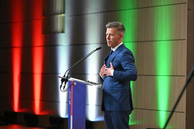 Peter Magyar, election winner and leader of the pro-European conservative TISZA party, delivers a press conference at the HUNGEXPO Congress and Exhibition Center in Budapest, Hungary, on April 13, 2026, one day after Hungarian general elections. The party of conservative Peter Magyar won a two-thirds parliamentary majority in Hungarian elections in a clear defeat for nationalist long-time Prime Minister Viktor Orban, according to near-complete results. (Photo by Attila KISBENEDEK / AFP)