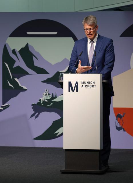 German Transport Minister Patrick Schnieder addresses a press conference on the official opening of the new Terminal 1 pier at Munich International Airport, southern Germany on April 13, 2026. The Terminal 1 Pier provides additional capacity for up to six million passengers per year. The new building is currently one of Bavaria’s largest infrastructure projects. (Photo by Alexandra BEIER / AFP)