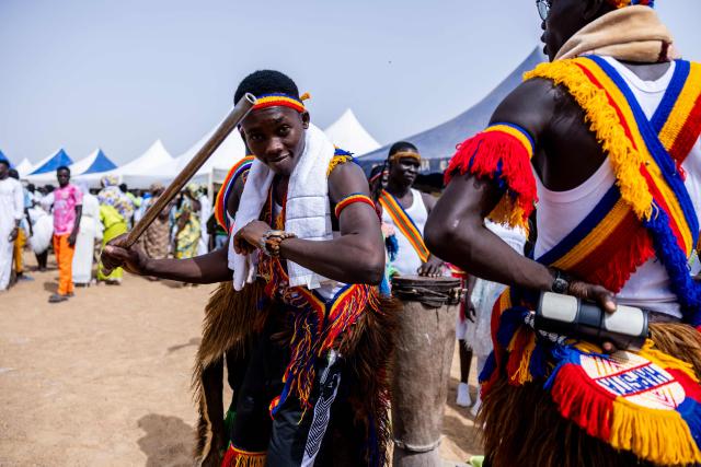 Massa dancers wait before the opening ceremony of the Tokna Massana Festival in Bongor on April 9, 2026. The culture of the Massa people was celebrated at the 10th edition of the Tokna Massana festival.
This year's celebration took on a special significance following the inscription last December of Guruna, a Massa pastoral initiation ritual, on UNESCO's list of intangible cultural heritage. (Photo by Joris Bolomey / AFP)