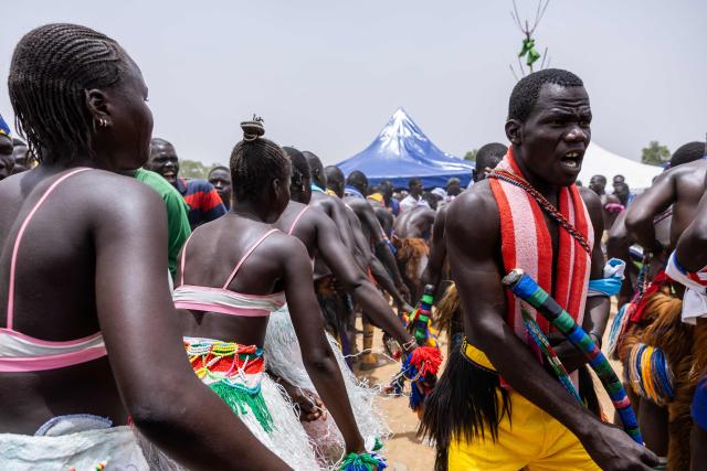 Chadian dancers from the Massa people dance a traditional Massa dance, during the Tokna Massana Festival in Bongor on April 10, 2026. The culture of the Massa people was celebrated at the 10th edition of the Tokna Massana festival.
This year's celebration took on a special significance following the inscription last December of Guruna, a Massa pastoral initiation ritual, on UNESCO's list of intangible cultural heritage. (Photo by Joris Bolomey / AFP)
